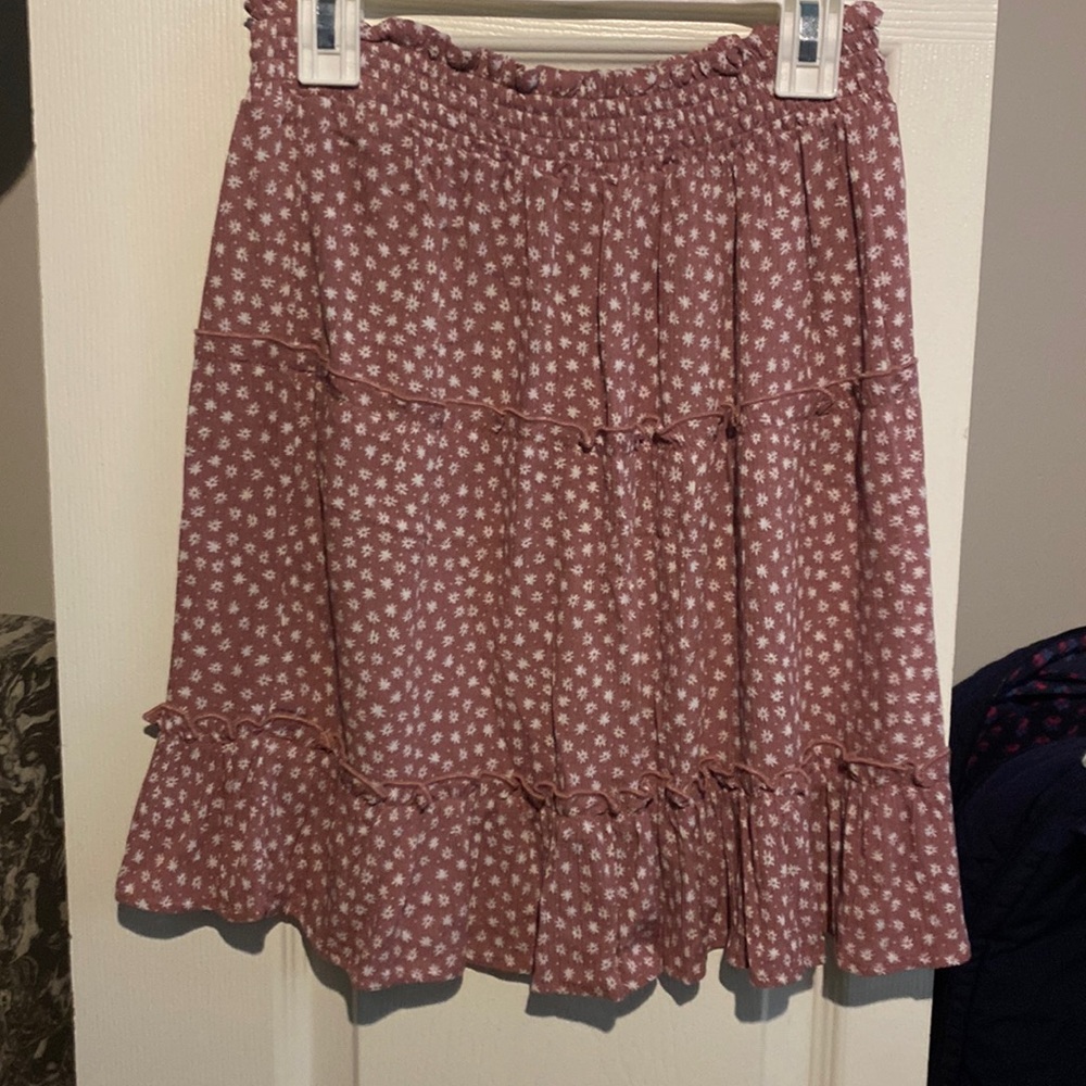 Pink with white flowers skirt.
